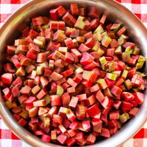 chopped rhubarb in a large metal pan.
