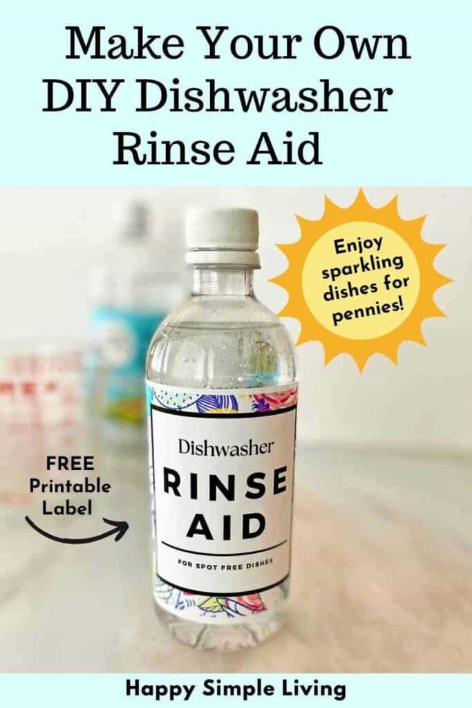 A clear bottle labeled Dishwasher Rinse Aid with a decorative label sits on a countertop. Text on the image reads, Make Your Own DIY Dishwasher Rinse Aid and Enjoy sparkling dishes for pennies! with an arrow pointing to a free printable label.