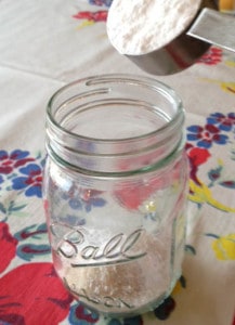 Combining the ingredients to make homemade stevia sweetener.